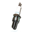 BR7ES Spark Plug with a white and black handle, close-up view, ideal for modern urban commuters and highway scooters, featuring a medium heat resistor type for optimal performance.