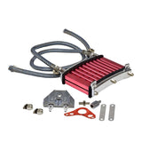 Oil Cooler Kit for 4-Stroke ATV, Dirt Bike, & Scooter Engines, featuring a metal housing, tubes, hoses, and fittings designed to reduce oil temperature and enhance engine performance.