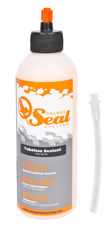 Orange Seal Tubeless Tire Sealant - 8 oz Bottle; a plastic bottle designed for easy sealant injection, featuring a twist-lock cap.