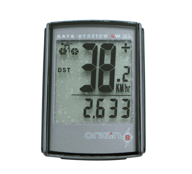 Origin8 Data Station 9W-XL Wireless Bike Computer close-up showing its digital display with numeric readings, highlighting its functions as a speedometer, clock, and trip timer.