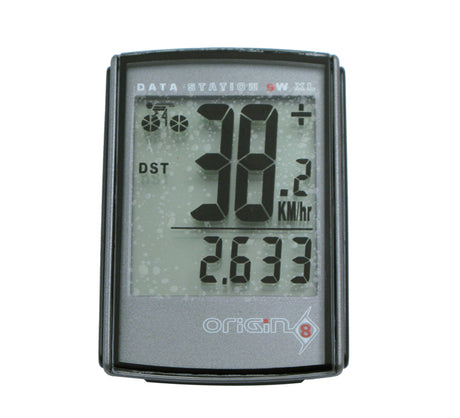 Origin8 Data Station 9W-XL Wireless Bike Computer close-up showing its digital display with numeric readings, highlighting its functions as a speedometer, clock, and trip timer.