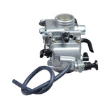 PD32J Carburetor for the Honda ATC250, TRX300, TRX350, & TRX400 FourTrax ATVs, featuring a silver body with attached black hoses, designed for 250cc to 400cc 4-stroke gas engines.