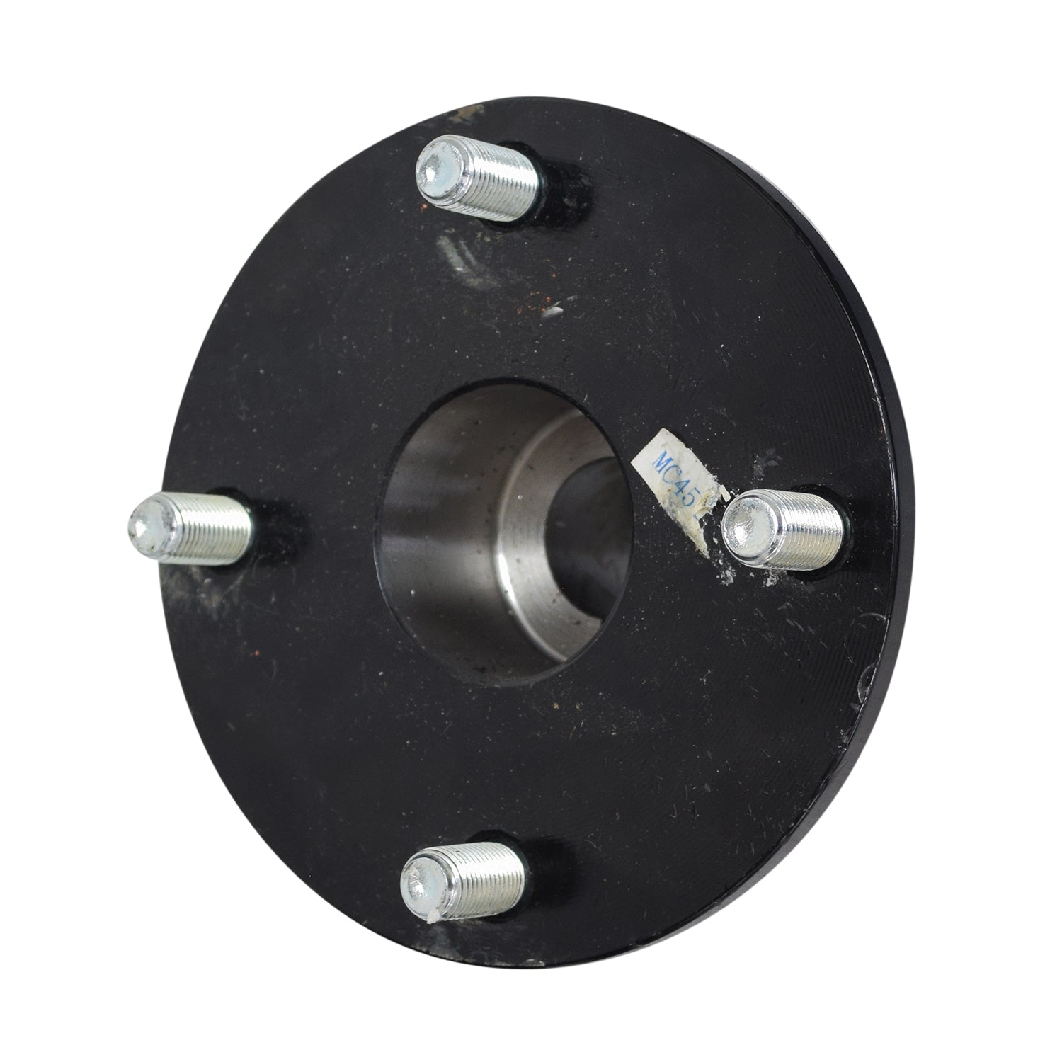 Hub for 4-Spoke Drive Wheels on Quantum Q6 Edge Z & Q6000Z Power Chairs, featuring a black metal circular object with silver screws and pre-installed threaded hubs for motor axle mounting.