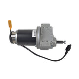 Motor & Gearbox Assembly for the Jazzy 614, featuring a grey electric motor with a black cord and plug-in connector. Includes a barcode label and metal plate with holes.