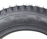 Close-up of a 14x3 (3.00-8) Black Pneumatic Mobility Tire with Q133 Tread, showcasing its detailed tread pattern and robust construction, designed for Pride Pursuit XL (SC714) mobility scooters.