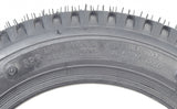 Close-up of a 14x3 (3.00-8) Black Pneumatic Mobility Tire with Q133 Tread, showcasing its circular tread pattern, designed for Pride Pursuit XL scooters.