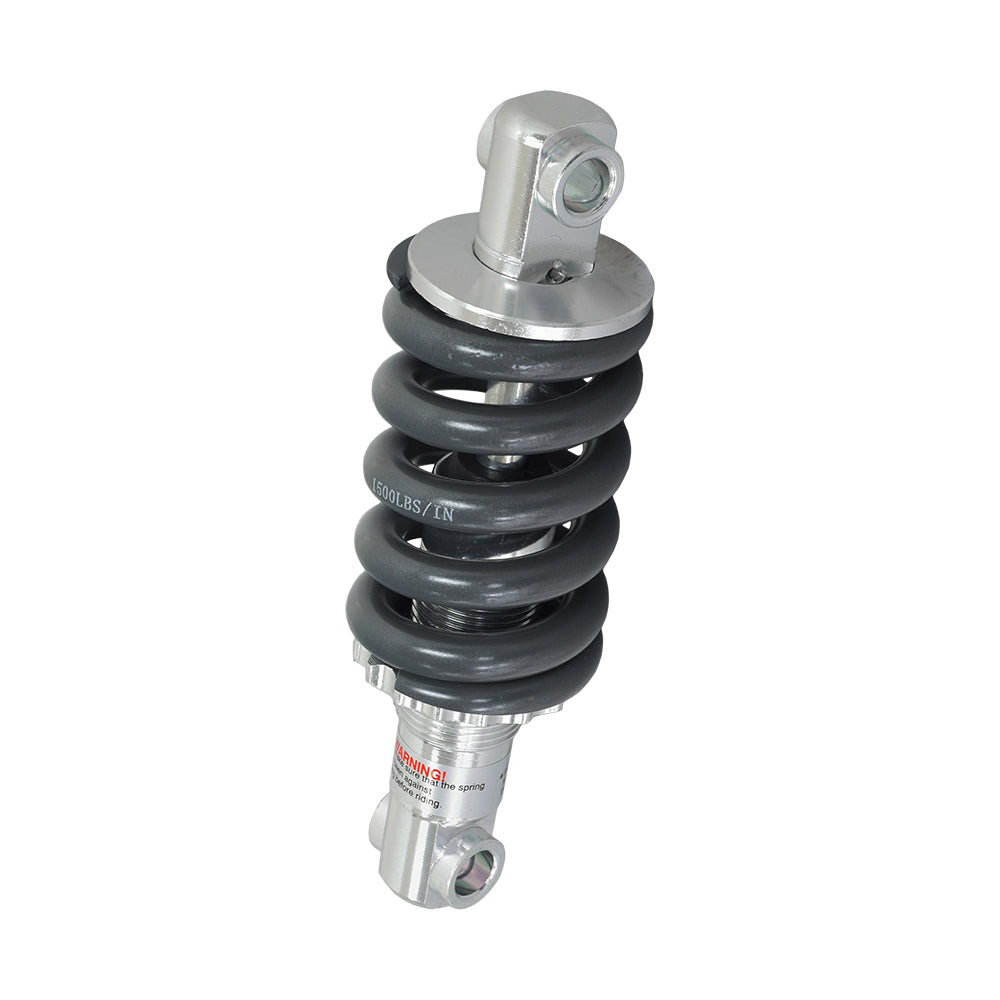 Front Strut Shock for the Quantum Q6 Edge, featuring a close-up of a black and silver coil spring and metal components, designed for either side of the Q6's front caster arm assembly.