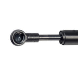 Shock Dampener for the Quantum Q6 Edge; a close-up of a black metal cylinder with a ball, part of the power chair's front caster suspension system.