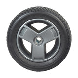 9 Foam-Filled Drive Wheel Assembly for the Go-Go Go Chair (2016 and Newer) featuring a black PU foam-filled tire on a Tri-spoke Euro Gray rim, ensuring a flat-free experience.