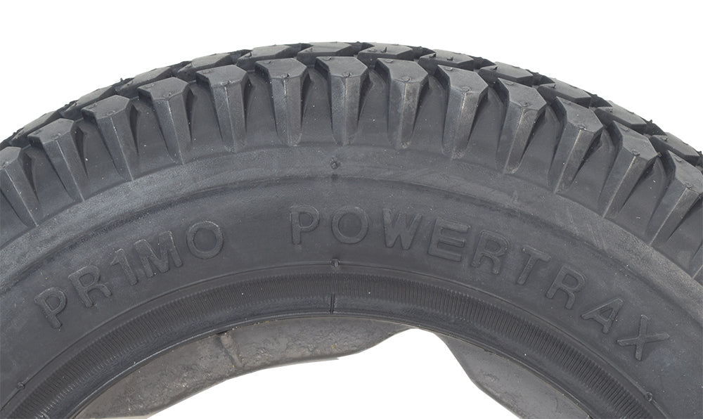 Close-up of a 14x3 flat-free black tire with C-248 Powertrax tread, designed for the Quantum Q6 Edge 2.0 & Q6 Edge 2.0 X power chairs, showcasing its durable knobby pattern.