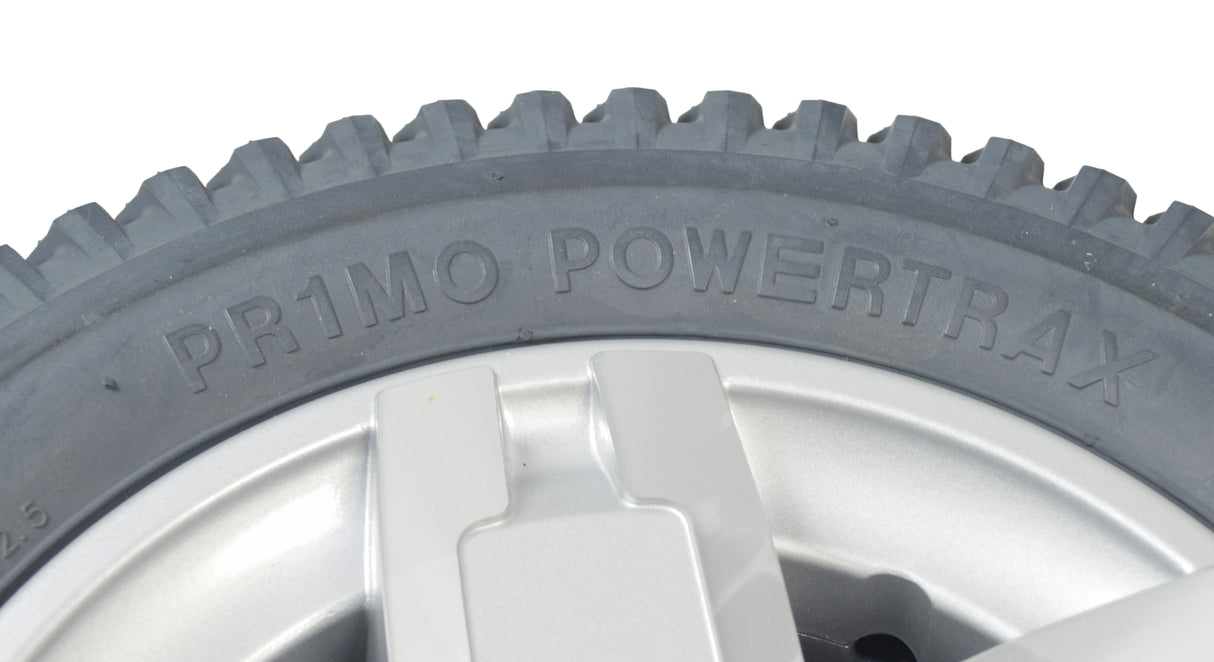 Close-up of the 14x3 Run Flat Drive Wheel Assembly for the Quantum Q6 Edge HD & Q6 Edge Z, showcasing the tire tread and silver-colored rim.