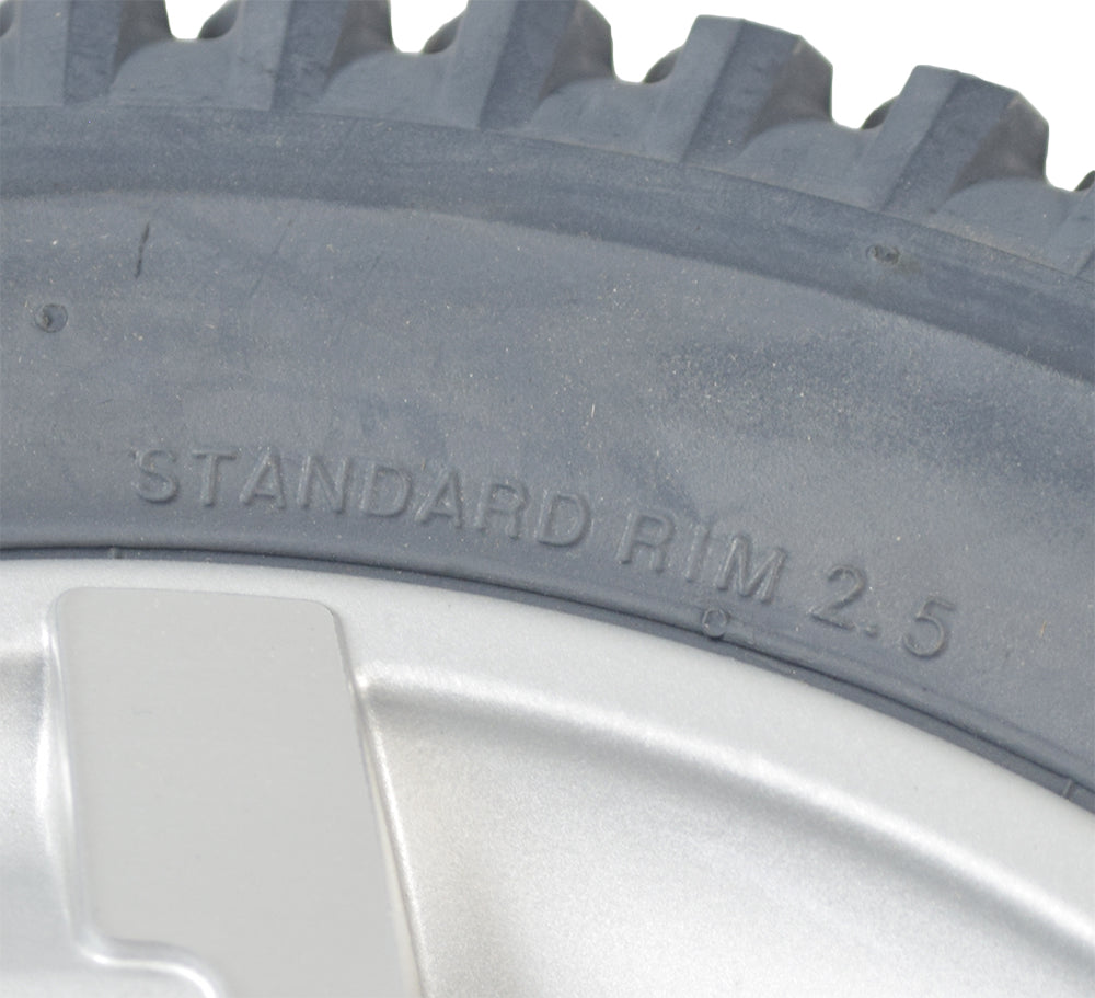 Close-up of the 14x3 Run Flat Drive Wheel Assembly for the Quantum Q6 Edge HD & Q6 Edge Z, showcasing the durable tire with a silver-colored rim designed to prevent pneumatic mishaps.