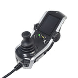 Expandable 4-Key Q-Logic 3 Joystick Controller for Quantum Q6 Edge 2.0 & Q6 Edge 3.0 Power Chairs, featuring a black and silver design with a green house icon on a black button.