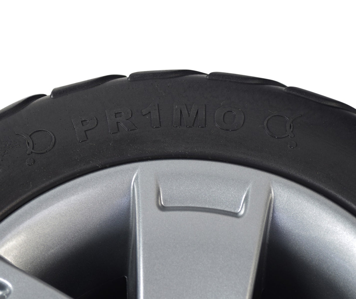 10.75 Flat-Free Rear Wheel Assembly for the Pride Victory 10.2, featuring a black PU foam-filled tire on a 5-spoke silver rim, shown in close-up detailing the tire's texture.