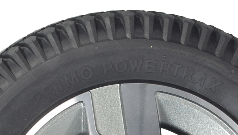 Close-up of the 14x3 Flat-Free Wheel Assembly with Titanium Rim for Quantum Q6 Edge 2.0 & Q6 Edge 2.0 X, showcasing the knobby tread black tire and split rim design for easy tire replacement.