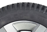 Close-up of the 14x3 Flat-Free Wheel Assembly with Titanium Rim for Quantum Q6 Edge 2.0 & Q6 Edge 2.0 X, featuring a knobby tread black tire and split rim design.