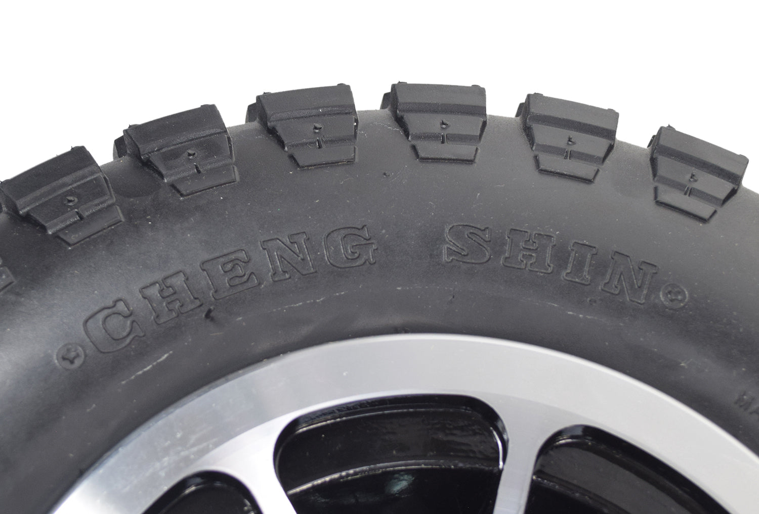 Close-up of the 14x4 Flat-Free Wheel Assembly with Black Rim for the Quantum 4Front, Q6 Edge 2.0, Q6 Edge 2.0 X, & Q6 Edge 3.0, showcasing the knobby tread and split rim design.