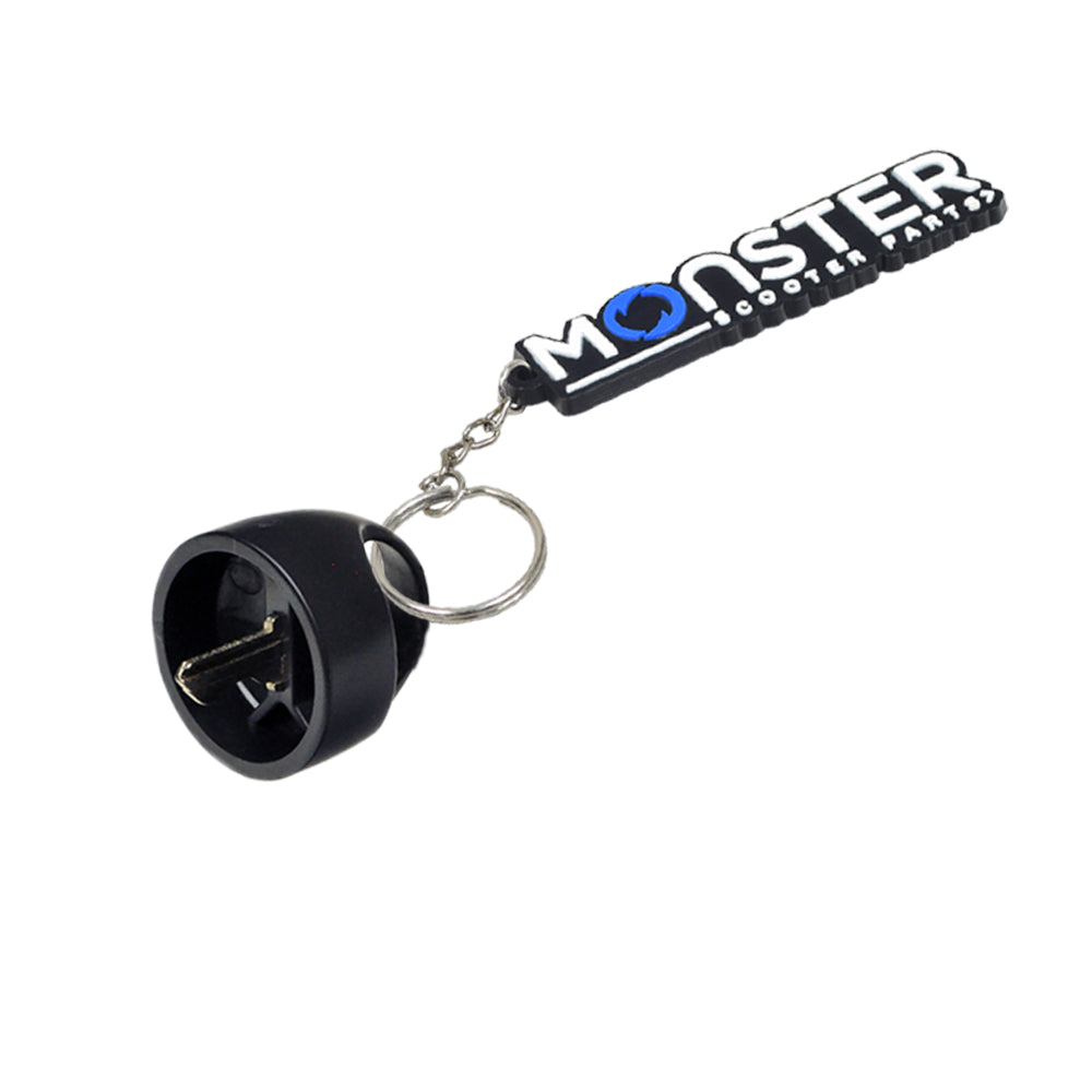 Deluxe Easy Pull Key for Pride and Go-Go Mobility Scooters, featuring a black key ring and a round molded black plastic knob with an easy pull finger ring for convenient handling.