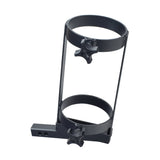 Oxygen Tank Holder Assembly with Mounting Bracket for Quantum Power Chairs with Synergy Seating; features a black metal structure with rings, handle lock knobs, a quick-release pull-pin, and mounting bracket.