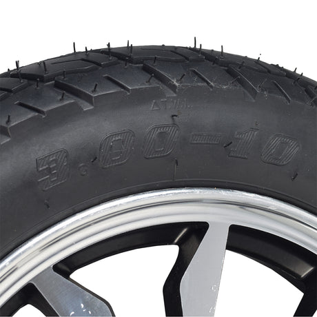 Close-up of the 16 rear wheel assembly for Pride Raptor & Baja Raptor 2 scooters, highlighting the large rubber tire with street-style tread and distinctive design.