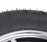 16 Rear Wheel Assembly for Pride Raptor & Baja Raptor 2 Scooters, featuring a close-up of the tire with a prominent street-style tread and sleek silver rim, showcasing its robust design.