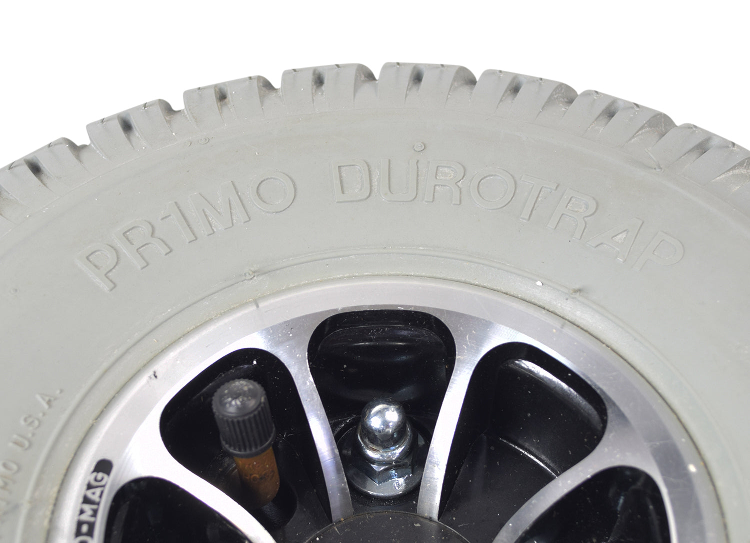 3.00-4 (10x3, 260x85) Pneumatic Drive Wheel Assembly for Jazzy and Jet Power Chairs, featuring a split rim design, visible bolts on the backside, and a distinct tread pattern.