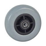 5x1.75 Flat-Free Caster Wheel Assembly for Jazzy Select Traveller, Z-Chair, and Go-Go Go-Chair Power Chairs, featuring a black rubber rim and grey tire with bearings and spacer.