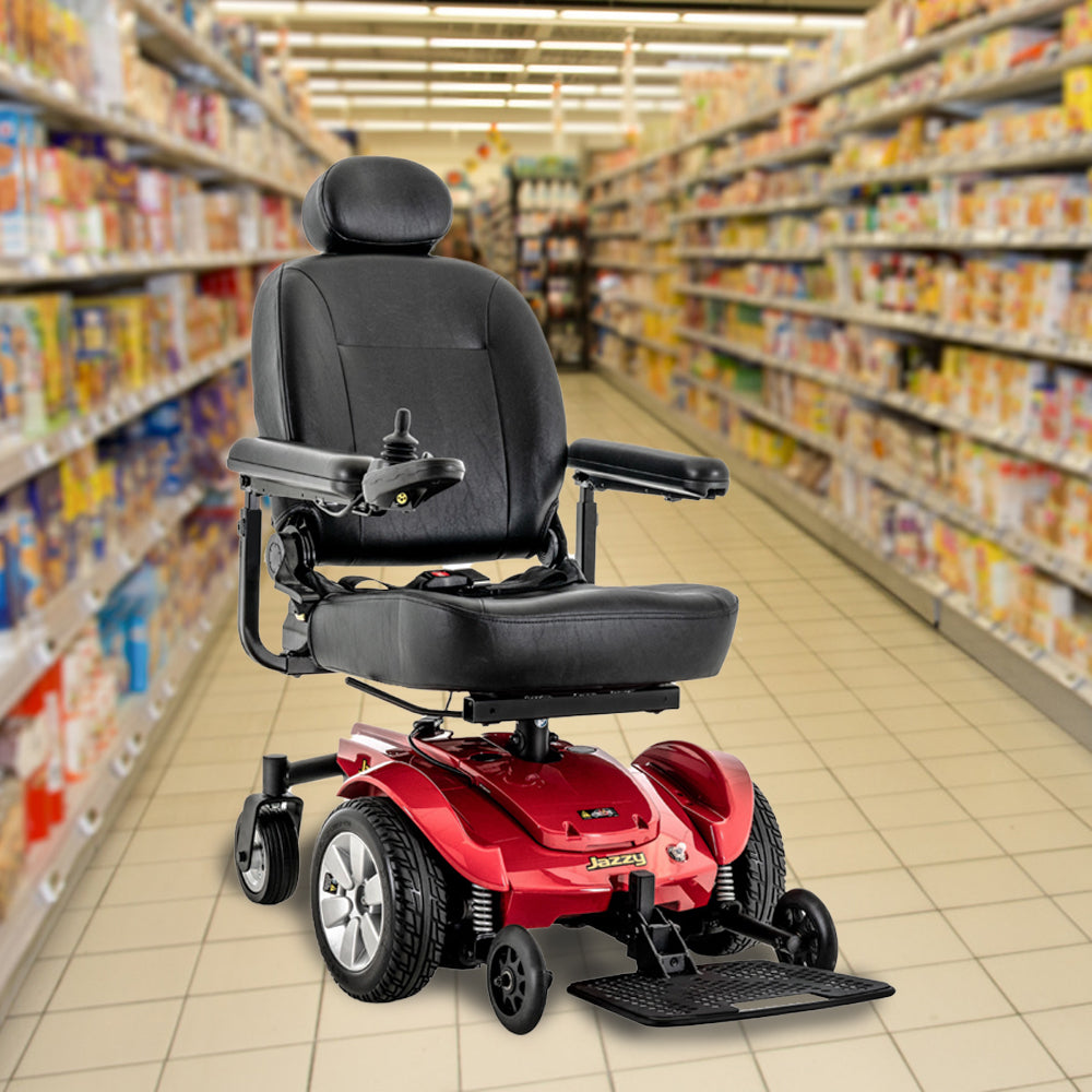 Keypad for 2-Key GC Joystick Remote for Jazzy Select Power Chairs displayed in a store, featuring the horn and On/Off buttons, positioned on a wheelchair joystick.