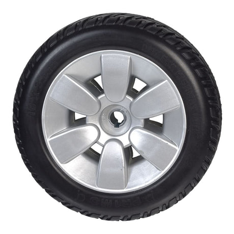 3.00-4 Flat-Free Drive Wheel Assembly with black tire for Jazzy Air, Select, & Select 6, featuring a silver rim and minor hub and rim scrapes from shipping.