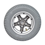 14x3 Pneumatic 5-Spoke Wheel Assembly with Silver Rim for the Quantum Q600, Q600XL, Q6000Z, and R4000 Power Chairs, showcasing a close-up of its silver rim and treaded tire.