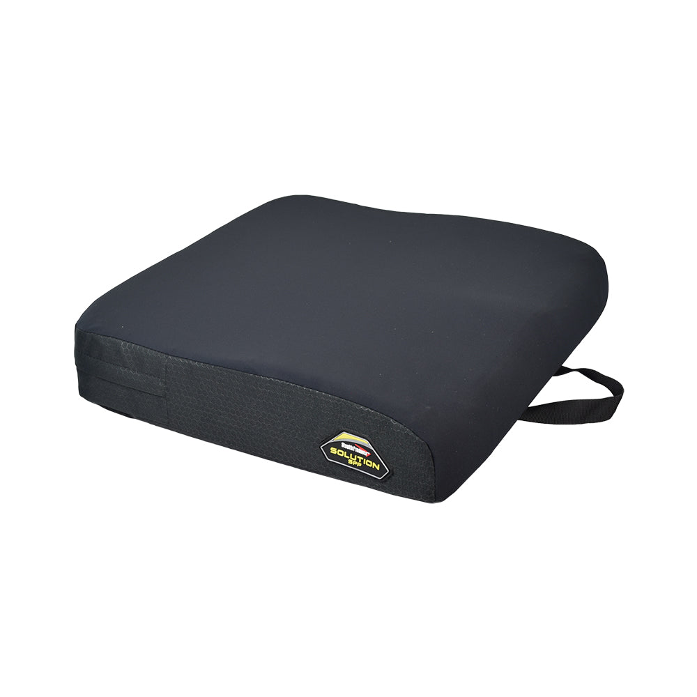 18 X 18 Stealth Solution Cushion for Quantum Power Chairs, featuring a black cushion with a strap and a black and yellow logo, designed for superior comfort and skin protection.