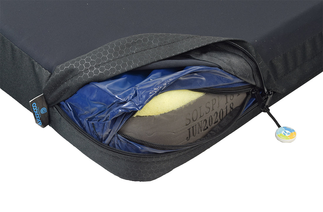 18 X 18 Stealth Solution Cushion for Quantum Power Chairs, featuring a twin-cell gel insert, Coolcore moisture-wicking cover, and a visible zipper for superior comfort and skin protection.