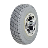 Flat-Free Rear Wheel Assembly for the Pacesaver Plus III Scooters, featuring a tire with a silver rim and Primo Durotrap tread design, ideal for both outdoor use and shopping malls.