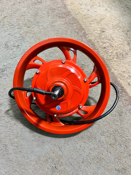 36 Volt Hub Motor & Red Rim for the Jetson Bolt Electric Bike (Blemished) showing the integrated hub motor, black hose, and metal components, emphasizing its compact and functional design.