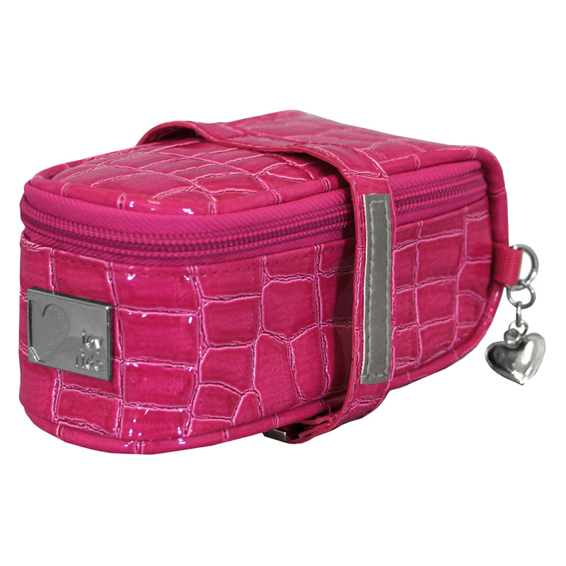 Pink Crocodile Saddle Up Seat Pouch for Bikes & Scooters featuring a heart charm, zipper, and strap, made from synthetic leather and reflective fabric, with a main compartment and snap closure for mounting.