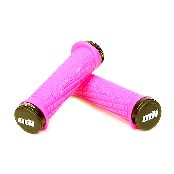 Pink Troy Lee Lock-on Handlebar Grips for Bikes & Scooters showing grooved channels and overmolded flap with a custom flanged design for added hand support.