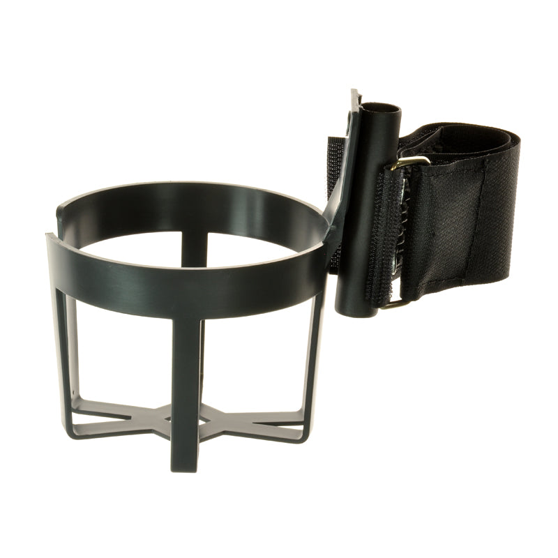 Black plastic cup holder with a sturdy black strap and metal clip, designed for wheelchairs, mobility scooters, and power chairs. It features a circular shape with a hole in the middle.