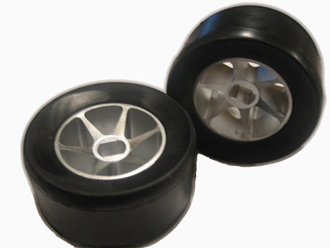 Powerkart Go Kart Rear Wheels (Set of 2) featuring high latex solid rubber tires and polished aluminum 6-spoke mag rims, shown in a close-up view.