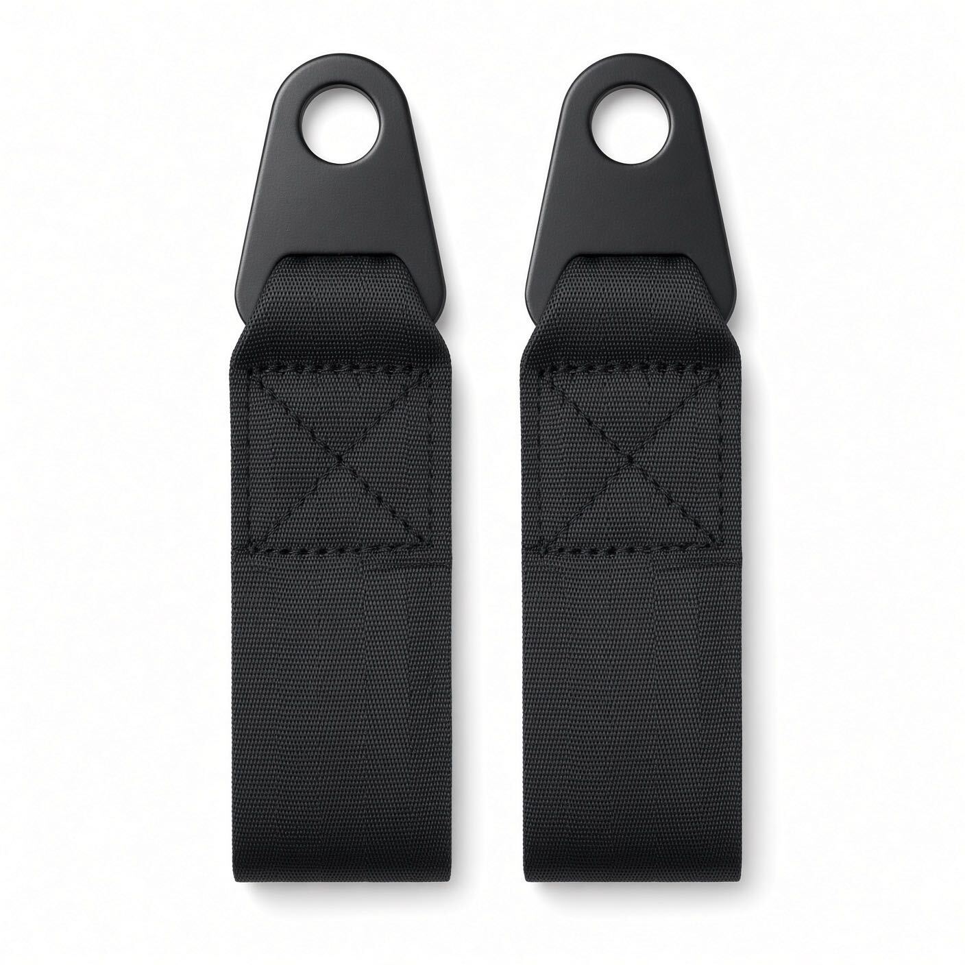 Two black steel eyelet mounting tabs with 5/8" hole and X-stitched webbing for bolting the seat belt to a power chair seat frame