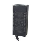 24 Volt 1.5 Amp 3-Prong Battery Charger featuring a black inline design with attached cord, close-up label with text and symbols, and LED display indicating charging status. Suitable for Razor scooters and other 24 volt scooters.