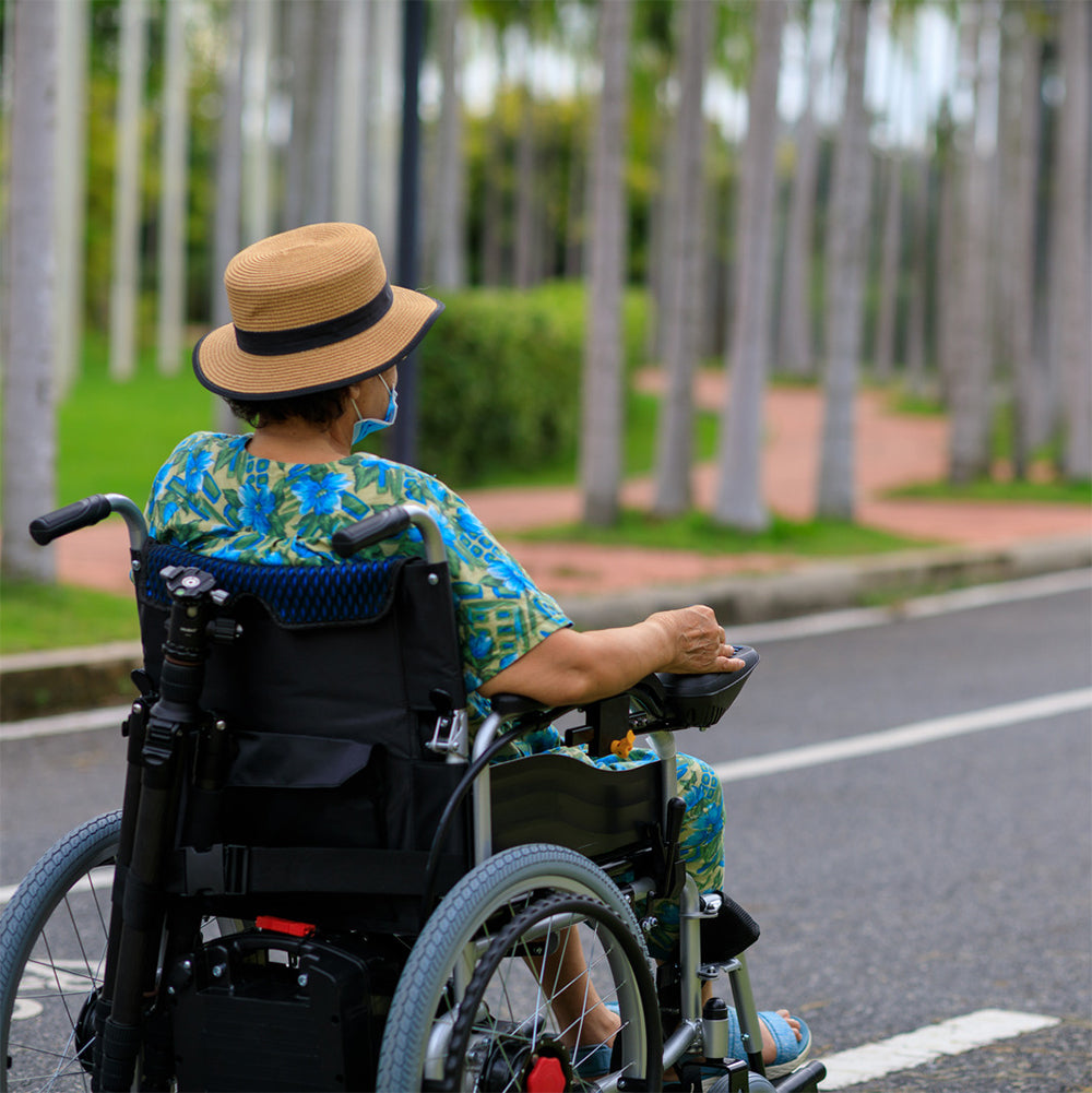 Joystick Skirt for Dynamic Joystick Remotes (Shark, SPJ+, A-Series) on a power chair, showing a close-up of the black rubber skirt under the joystick knob, protecting the electronics.