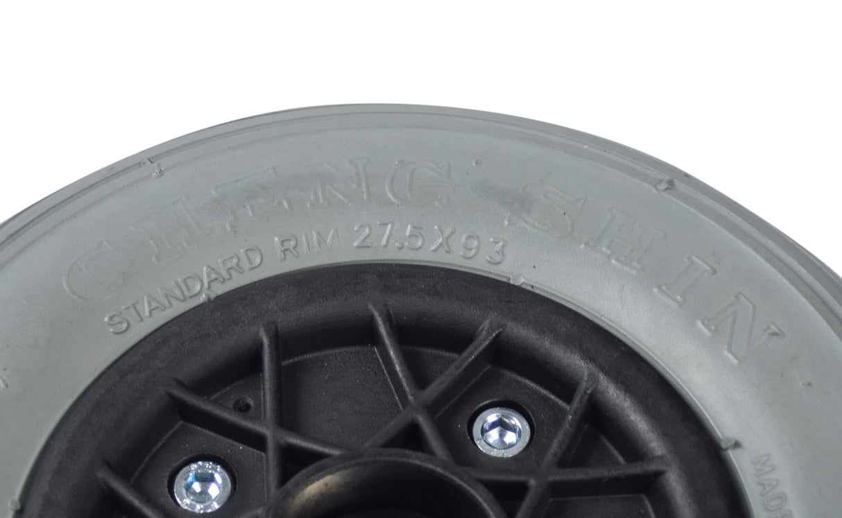 Close-up of an 8x2 (200x50) rear wheel assembly for Invacare Lynx L-3 & L-4 mobility scooters, highlighting the tire's tread pattern and the black plastic hub with metal screw.