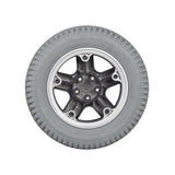 14x3 (3.00-8) Drive Wheel Assembly for Invacare Storm 3G Series Power Chairs Manufactured After 08/16/10, featuring a foam-filled, flat-free tire with knobby tread and a 5-hole, 2-part rim.