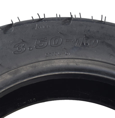 3.50-10 (100/90-10) Tubeless Scooter Tire with QD004 tread, designed for the TaoTao CY50-B Scooter. Close-up shows detailed tread pattern and sidewall text, highlighting its durability and street readiness.