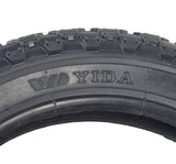 12-1/2x2-1/4 (57-203/62-203) Tire and Tube Set with Knobby Tread for Kick Scooters, featuring a close-up of the tire's detailed knobby tread pattern.