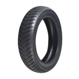 12-1/2x3.0 Tire with V-Groove Q212 Tread for Currie & Schwinn Scooters, showcasing a close-up of its detailed tread pattern designed for superior grip on hard-paved surfaces.