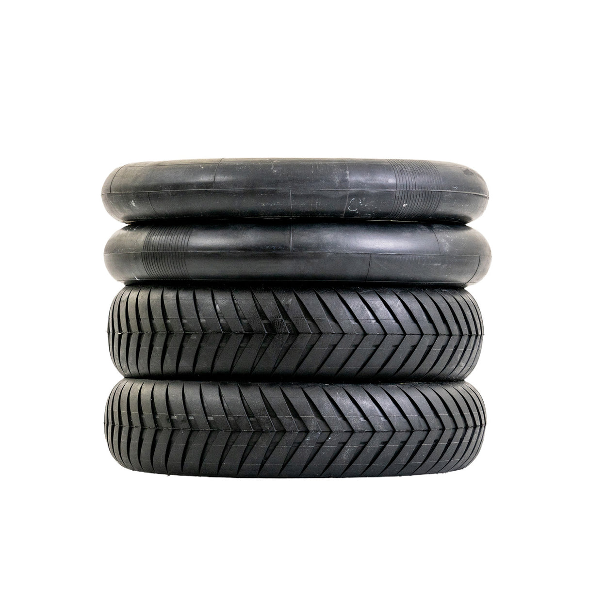 Stack of 12-1/2 x 3.0 Street V-Groove Tires for Schwinn S750 electric scooter, showcasing the V-grooved tread pattern designed for enhanced grip on paved surfaces.