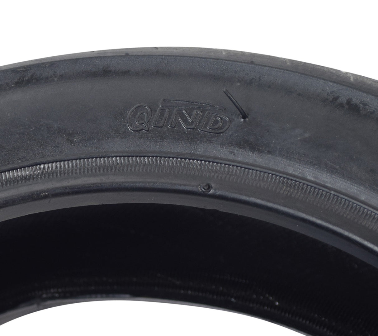 Close-up of the 12-1/2x3.0 Tire with V-Groove Street Tread for the Schwinn S500 Scooter, highlighting the shallow grooves designed for optimal grip on hard-paved surfaces.