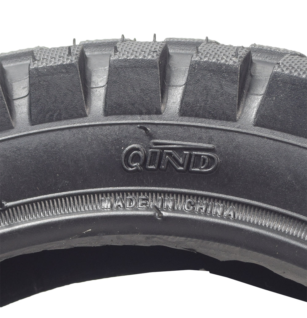 Close-up of a 12-1/2x2.75 Dirt Bike Tire with KF824 Knobby Tread, showcasing the detailed tread pattern, designed for the Fit Right FRP DB001 50cc Dirt Bike.