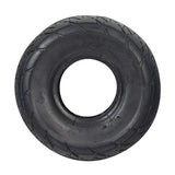 3.00-4 (10x3, 260x85) Tire for Razor E300 Scooter (Versions 1-40) featuring a black tire with a circular tread pattern and a white center.